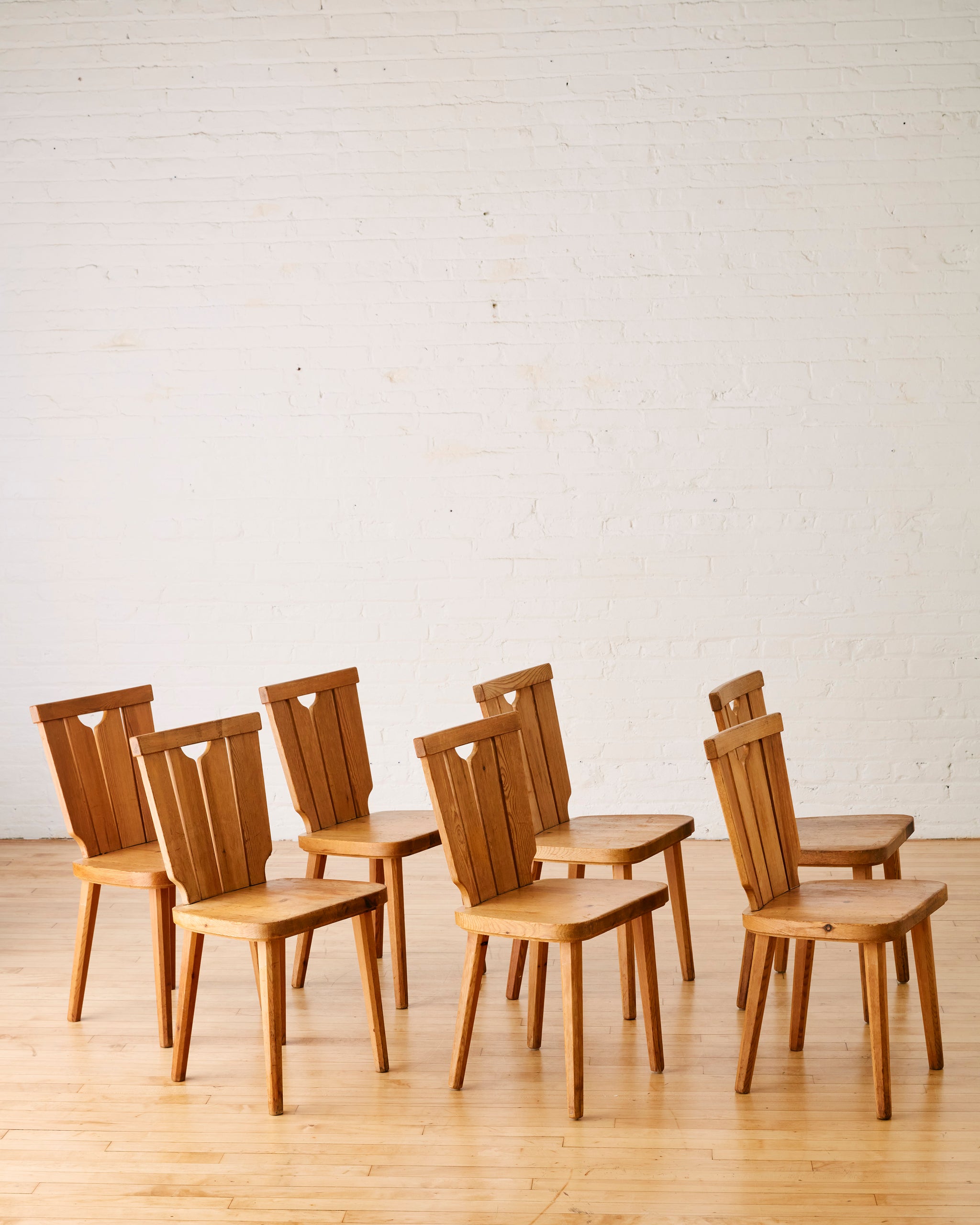 SET OF SEVEN SWEDISH PINE DINING CHAIRS BY GORAN MALMVALL C.1960