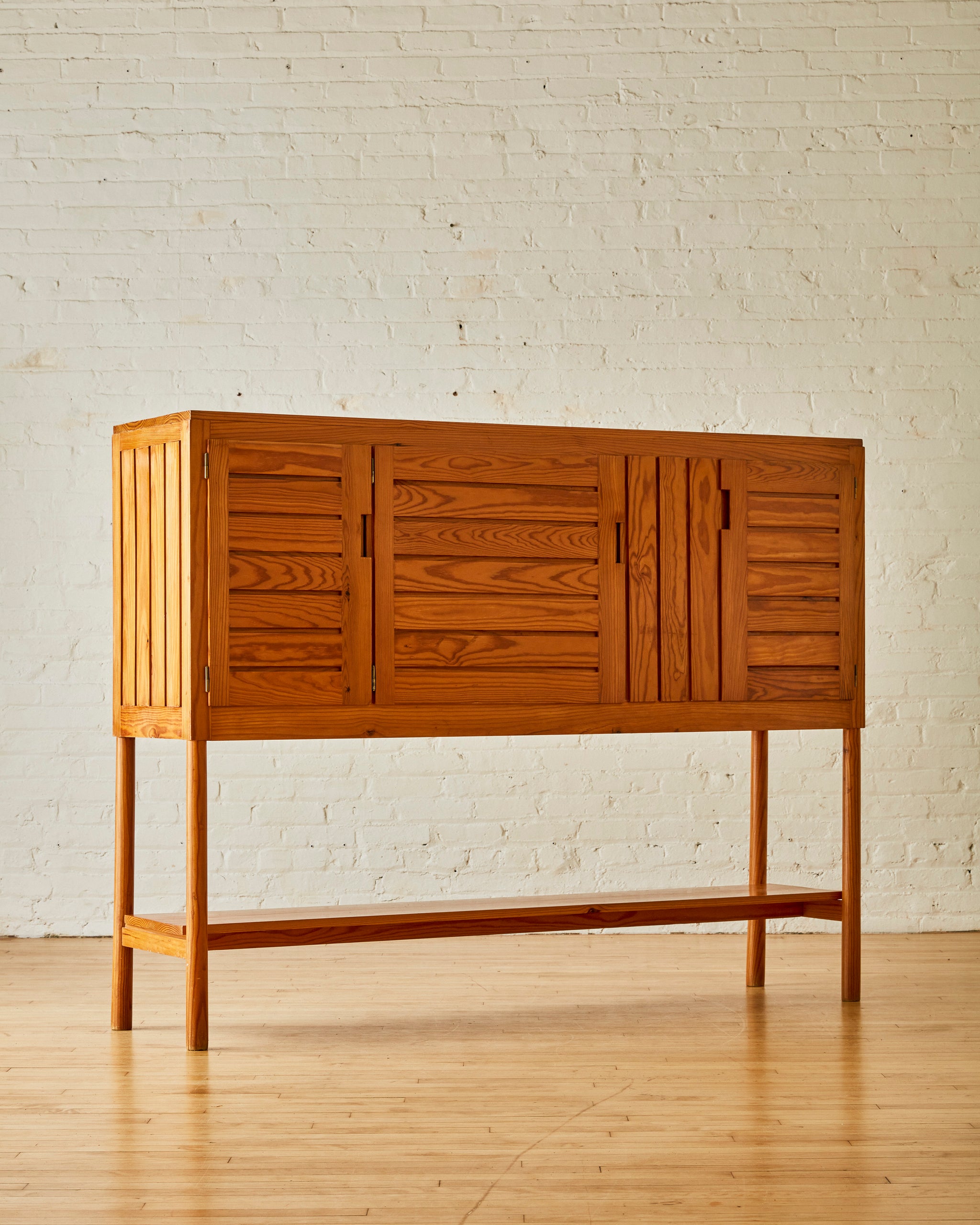 RAISE THREE DOOR CABINET BY PIERRE GAUTIER DELAYE C. 1950